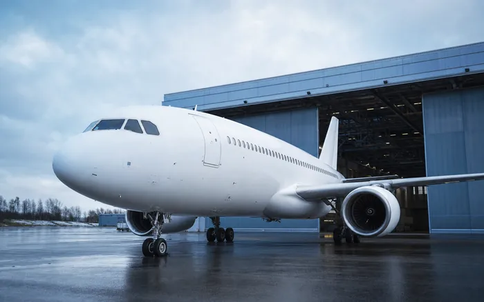 A Nordwing aircraft in front of a hangar