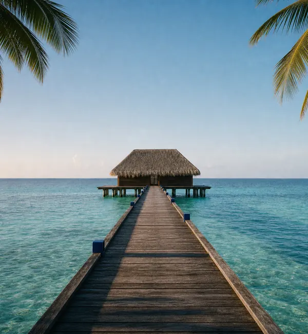 Overwater bungalow at the end of a wooden pier