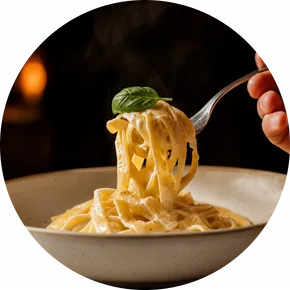 A forkful of creamy pasta