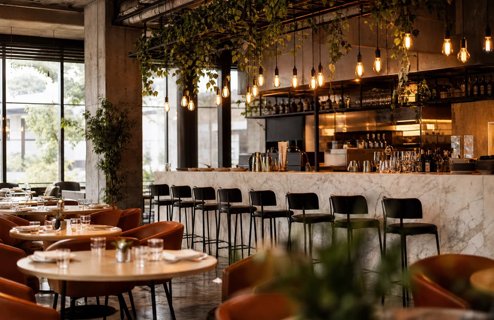 The Washington bar, hanging bulbs over a marble counter